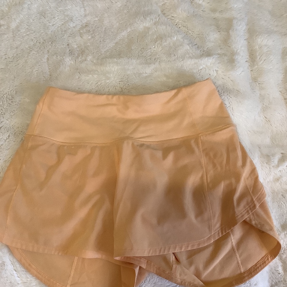 Lululemon Speed Up shorts. Size 2 in Summer glow